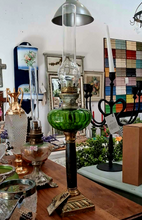 Green glass oil lamp