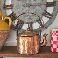Antique copper kettle